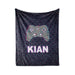A black and purple patterned blanket with a Nintendo Wii controller design and the name "KIAN" printed on it.