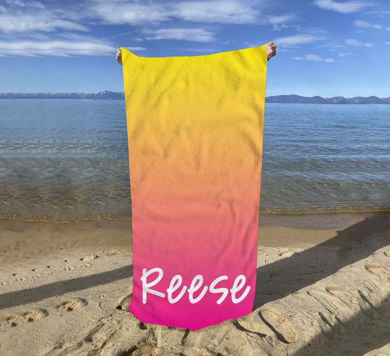 a beach towel with the word reese written on it