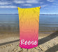 a beach towel with the word reese written on it