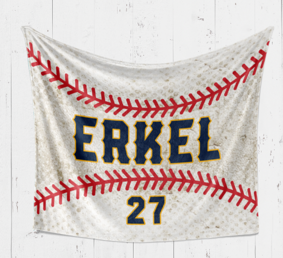 A baseball-themed blanket with the name "ERKEL" and the number "27" printed on it, along with a baseball design.
