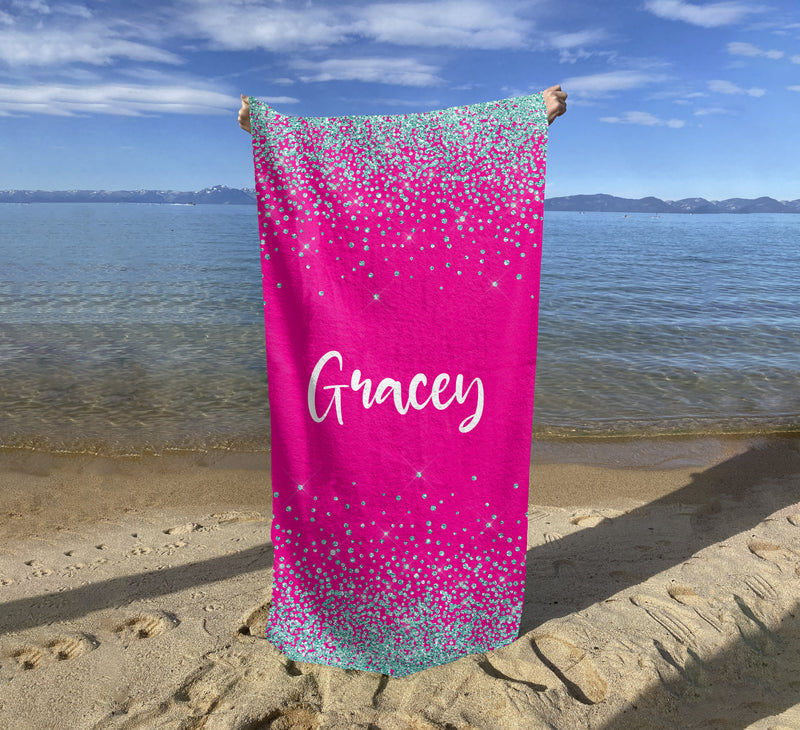 a beach towel with the word gracey written on it