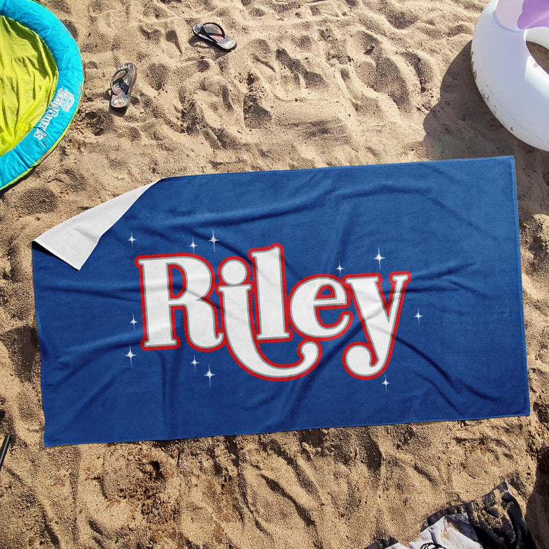 a towel that is laying in the sand
