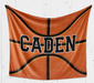 A basketball-themed blanket with the name "Caden" printed on it.