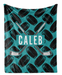 A personalized hockey blanket with a repeating pattern of hockey sticks crossed over each other and the name "Caleb" printed on it.