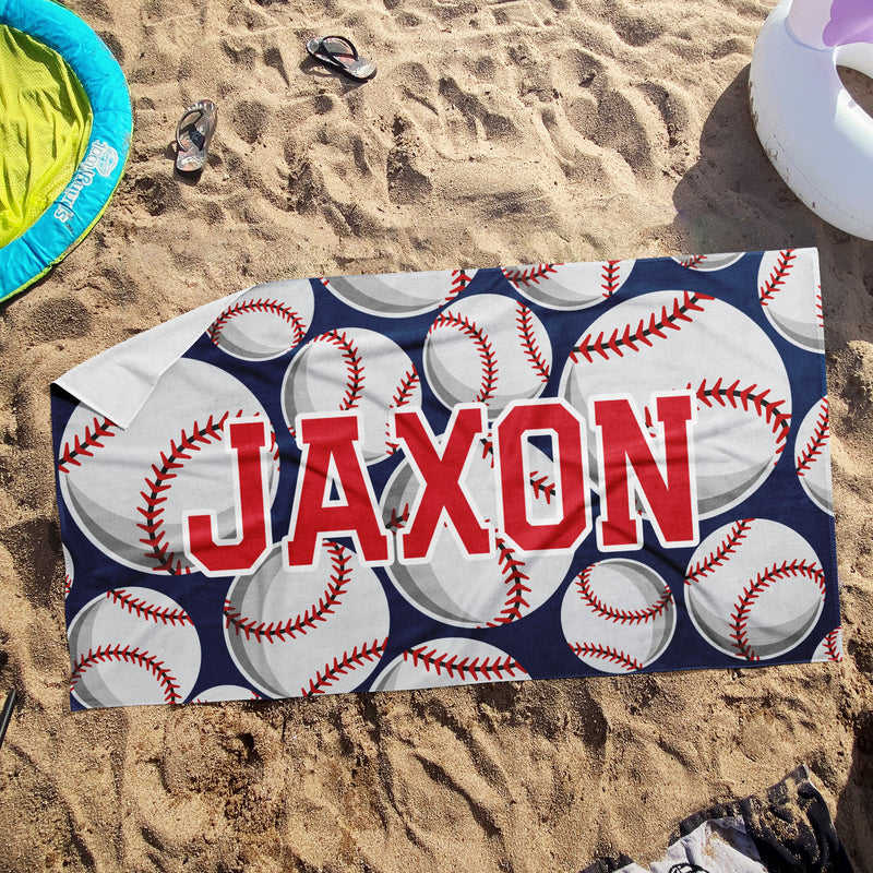 a towel with a name and baseballs on it