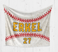 A baseball-themed blanket with the name "ERKEL" and the number "27" printed on it, along with a red and white baseball design.