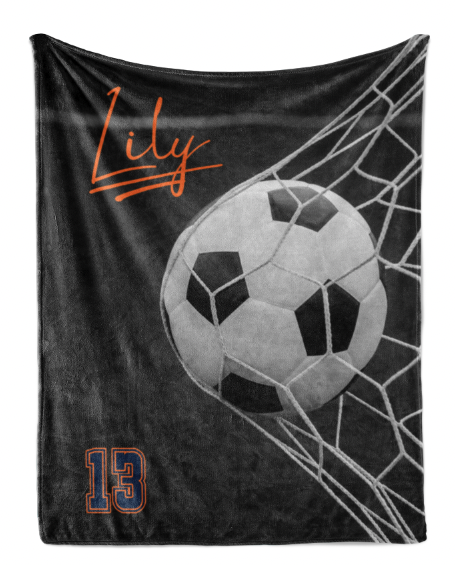 A black and white image of a soccer ball being caught in a net, with the name "Lily" written above it.