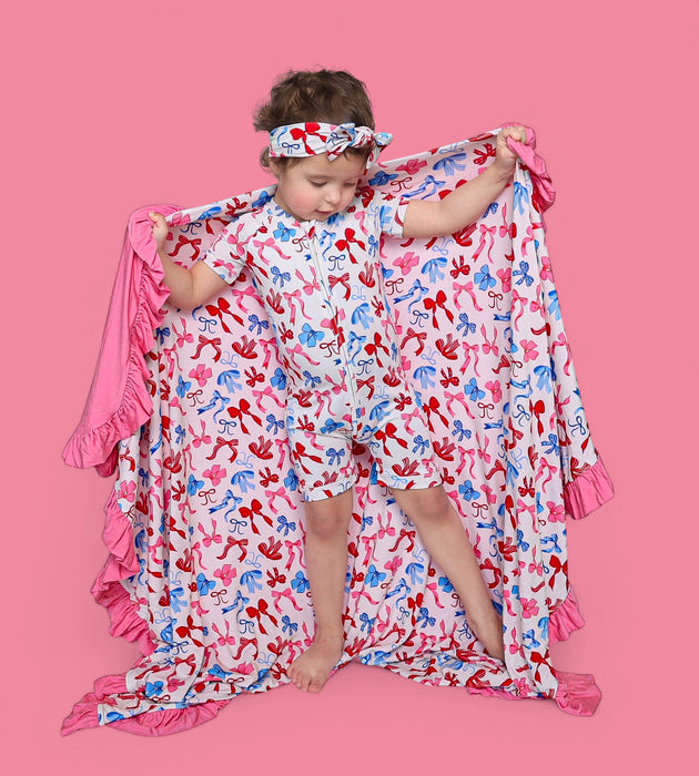 RED, WHITE AND BOWS DREAM RUFFLE BLANKET