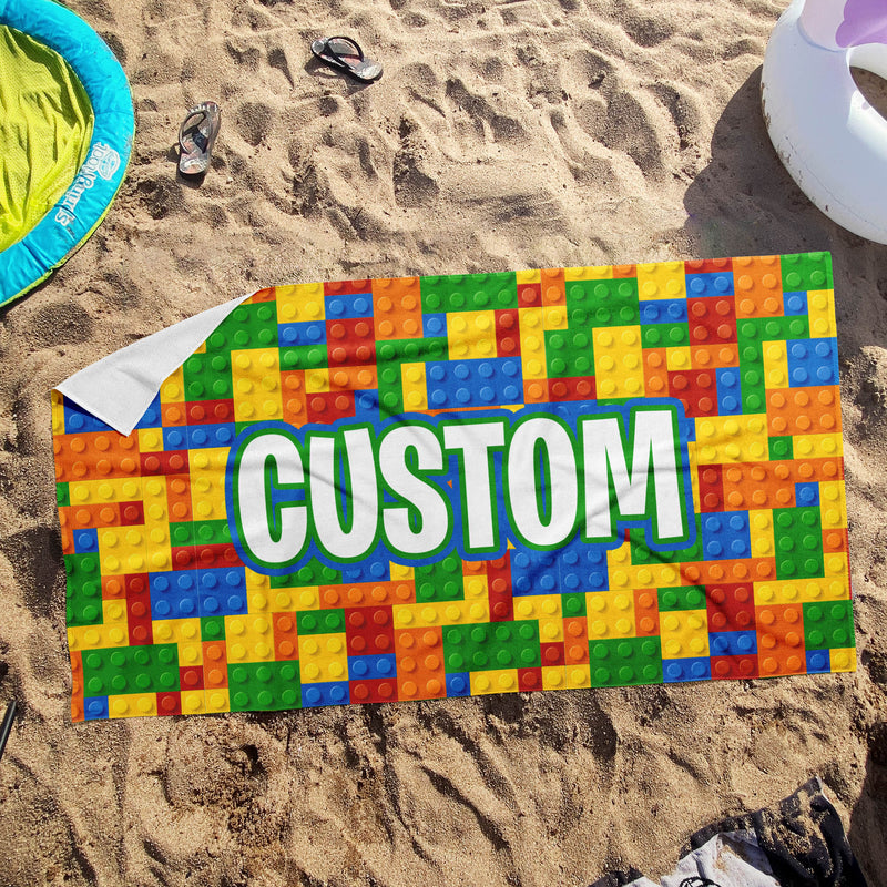 a beach towel with the word custom written on it