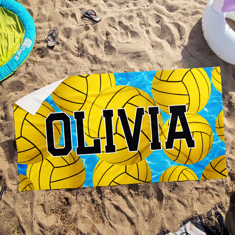 a beach towel with a volleyball ball on it