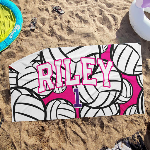 a beach towel with the name riley on it