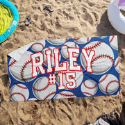 a towel that says riley is on a beach