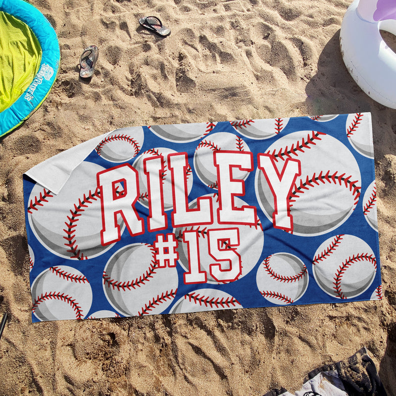 a towel that says riley is on a beach