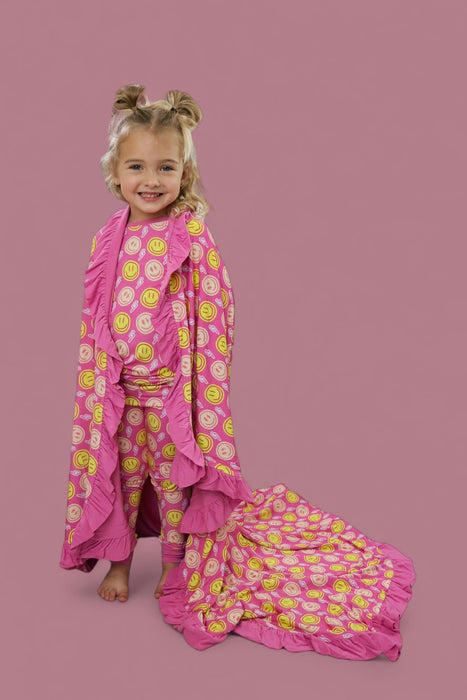 RADIANT SMILES DREAM RUFFLE BLANKET