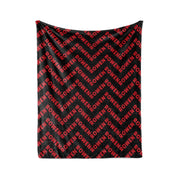 a black and red chevron pattern with the word "ROWEN" repeated across it.