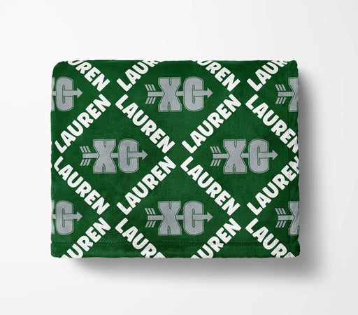 a green fabric with a repeating pattern of the letters 'XG' and 'Lauren' in white text.