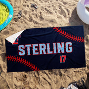 a towel with the name sterling on it laying in the sand